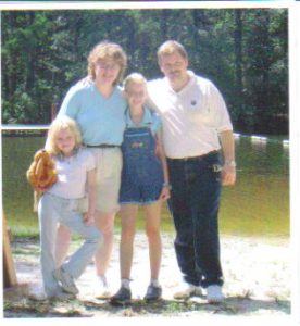 delanco-camp-schnyers (From left to right) Ashley, Peg, Christy and Tracy Schnyer in front of Lake Agape a few years ago